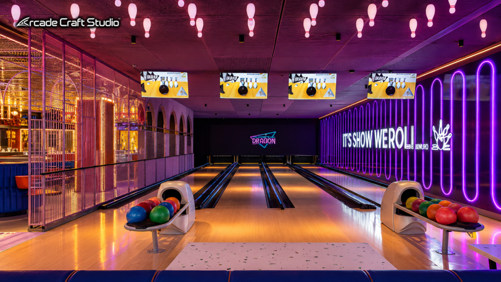 Boutique bowling zone at a Saudi Arabia family entertainment center with polished wood lanes, colored bowling balls, bowling-pin ceiling lights and neon signage